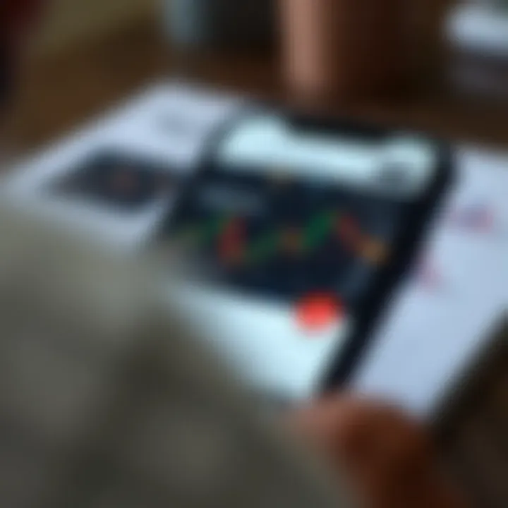 Smartphone displaying a low-cost trading app interface with stock market charts and minimal fees